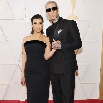 hollywood, california march 27 l r kourtney kardashian and travis barker attend the 94th annual academy awards at hollywood and highland on march 27, 2022 in hollywood, california photo by mike coppolagetty images